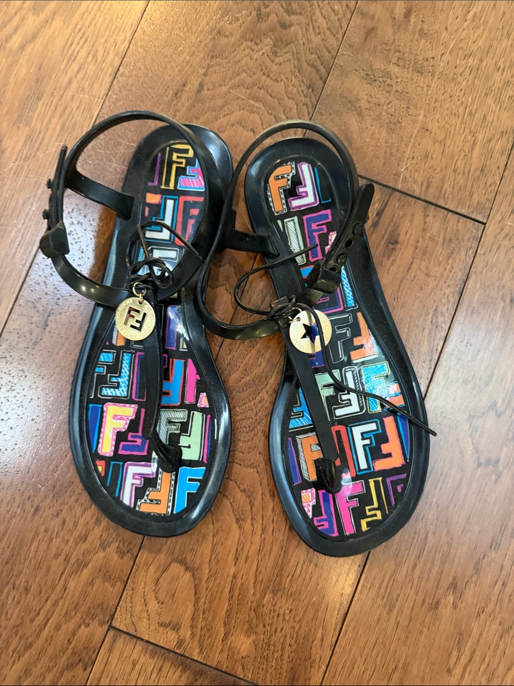 Authentic Fendi Black Jelly T-Strap Sandals with Multicolor Logo Footbed